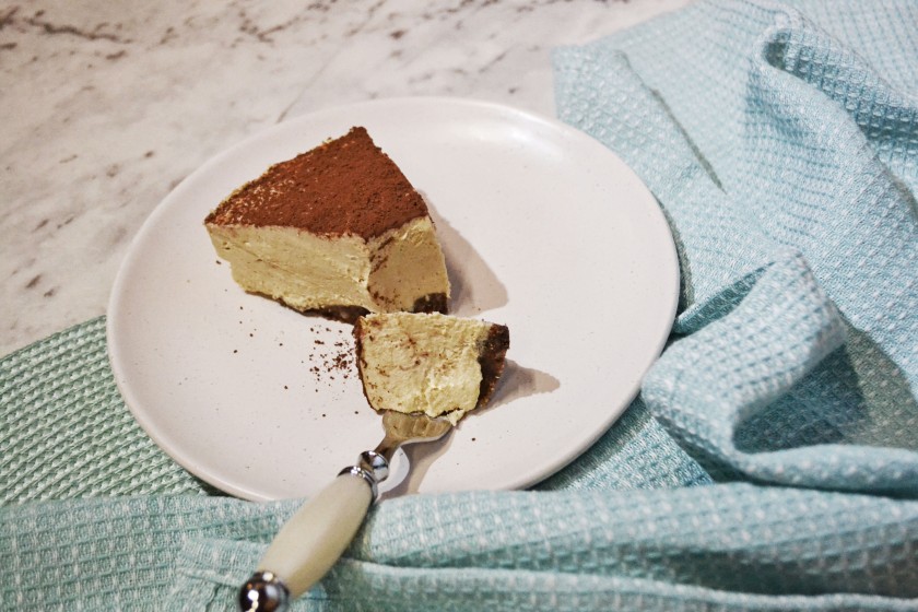 A creamy no bake cheesecake with a coffee flavour and walnut base